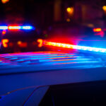 Red and blue police lights. Obtain a police report in the event of a car accident.
