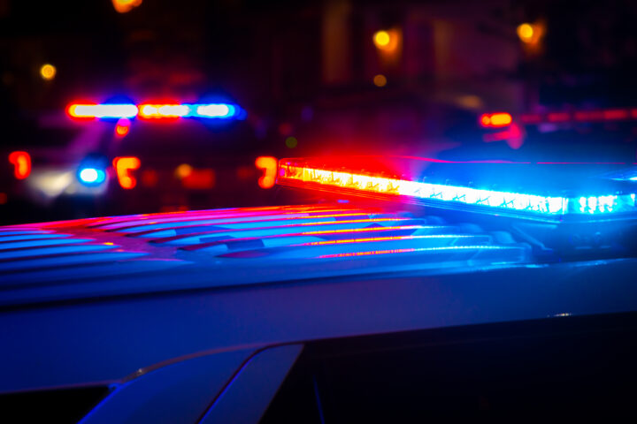 Red and blue police lights. Obtain a police report in the event of a car accident.